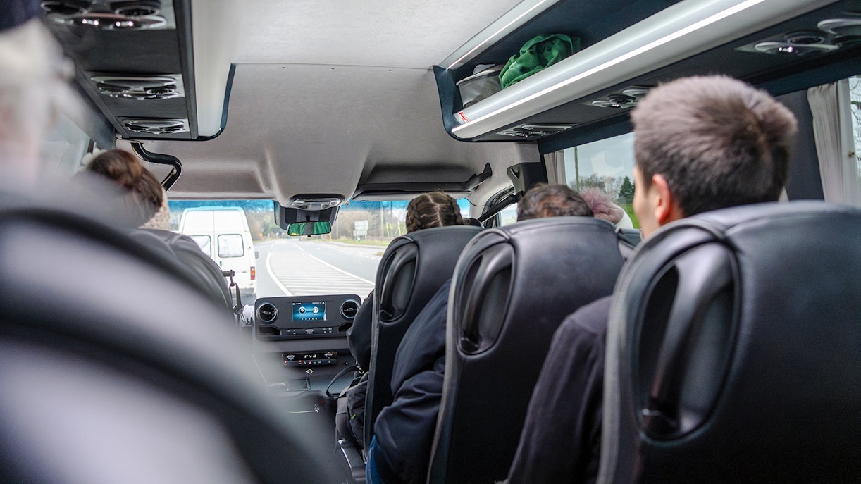Minivan interior during Komani Lake and Shala River tour transfer from Tirana.