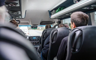 Minivan interior during Komani Lake and Shala River tour transfer from Tirana.