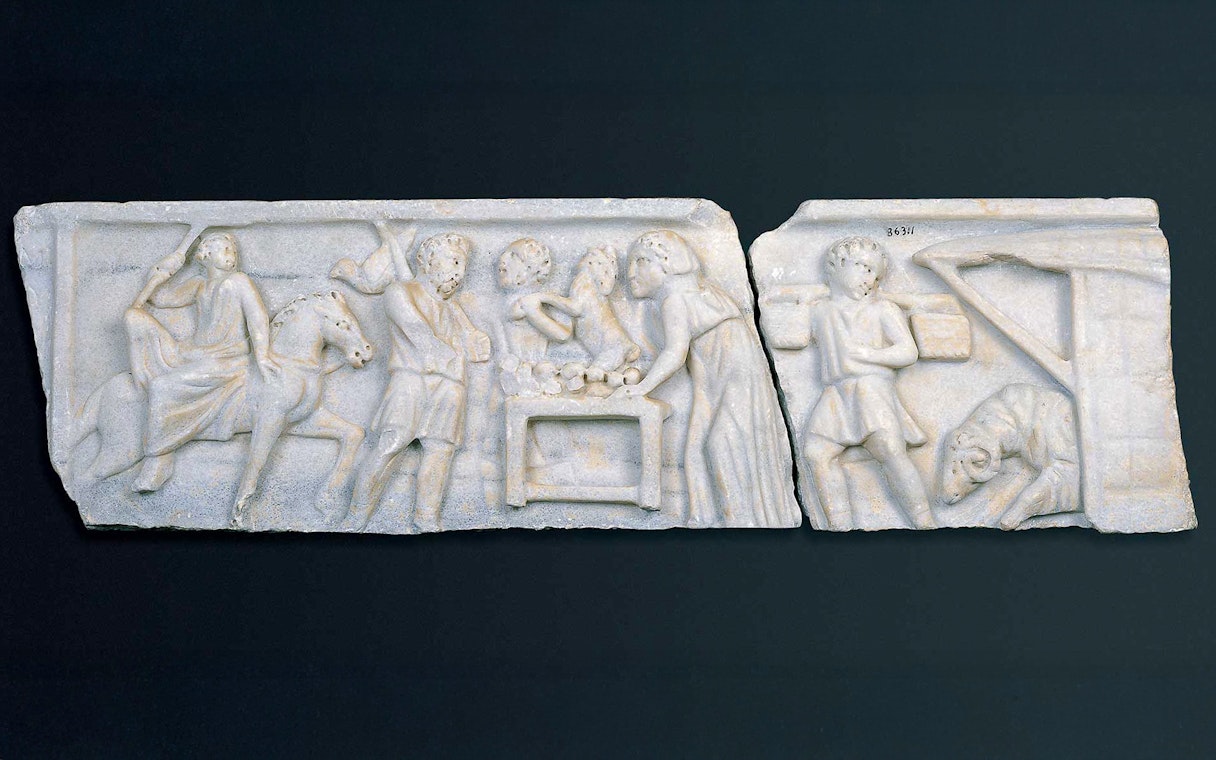Early Christian marble sarcophagus fragment depicting biblical scenes with figures and animals.