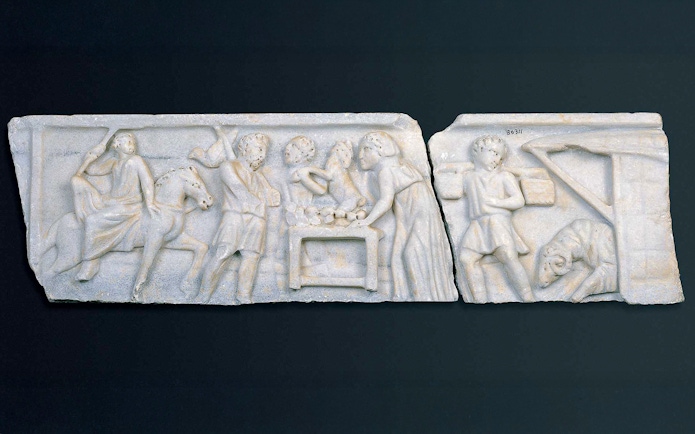 Early Christian marble sarcophagus fragment depicting biblical scenes with figures and animals.