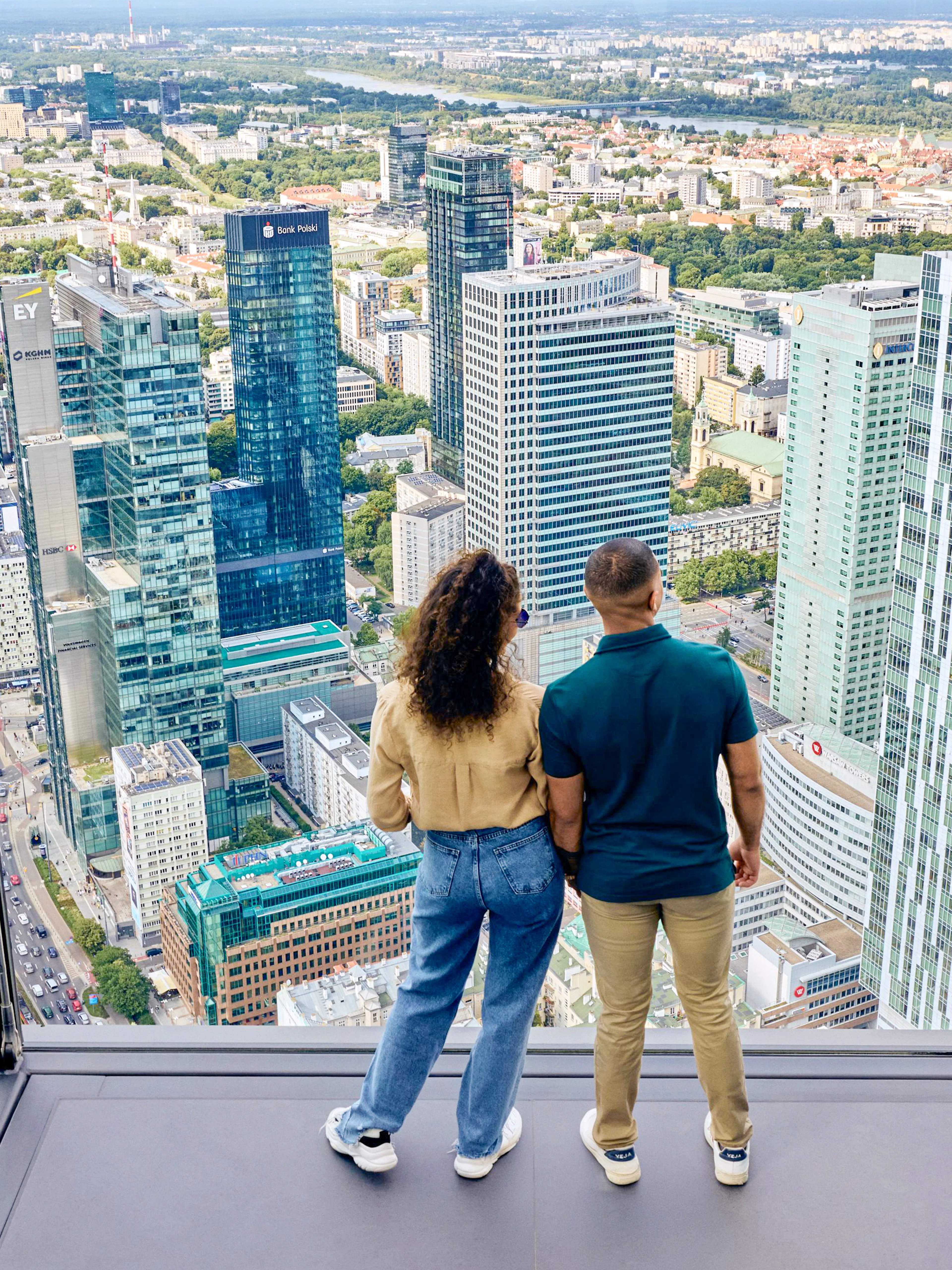 Couple enjoying panoramic view from Highline Warsaw terrace.