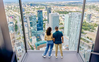 Couple enjoying panoramic view from Highline Warsaw terrace.
