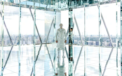 Reflection in mirrored observatory at Akara Sky Hanuman, Bangkok, Thailand.