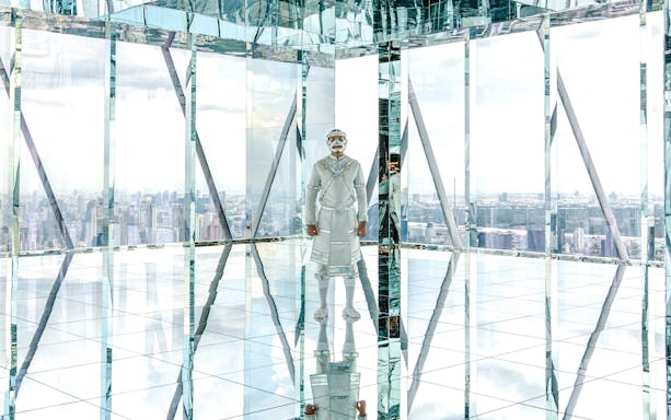 Reflection in mirrored observatory at Akara Sky Hanuman, Bangkok, Thailand.