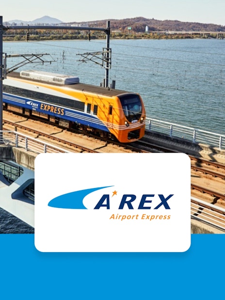 AREX Express train crossing a bridge over water between Incheon Airport and Seoul.