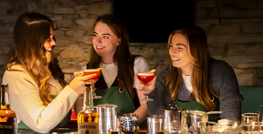 Participants enjoying cocktail making at Jameson Midleton Distillery.