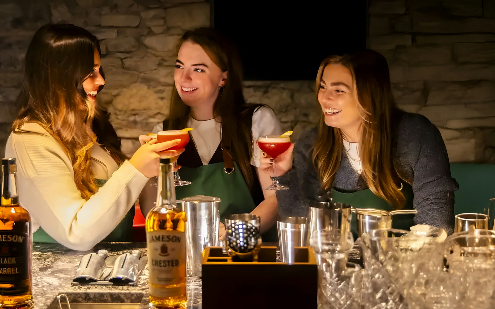 Participants enjoying cocktail making at Jameson Midleton Distillery.