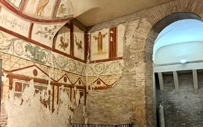Frescoes and ancient walls in the Roman Houses of the Celio Hill Underground.