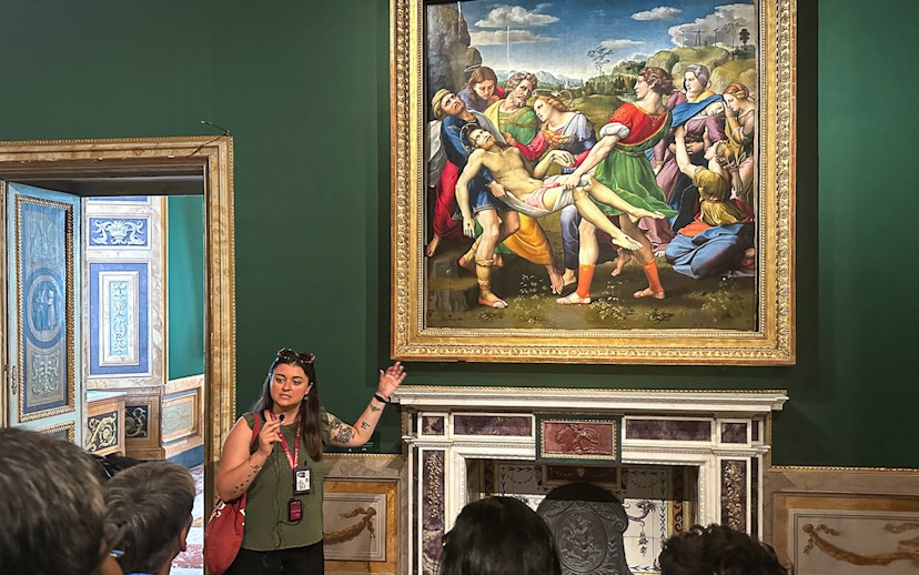 Tour guide explaining "The Deposition" by Raphael at Borghese Gallery, Rome.