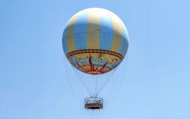Hot air balloon in clear sky, part of Combo: Hot Air Balloon + Isla Mágica Tickets.