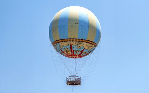 Hot air balloon in clear sky, part of Combo: Hot Air Balloon + Isla Mágica Tickets.