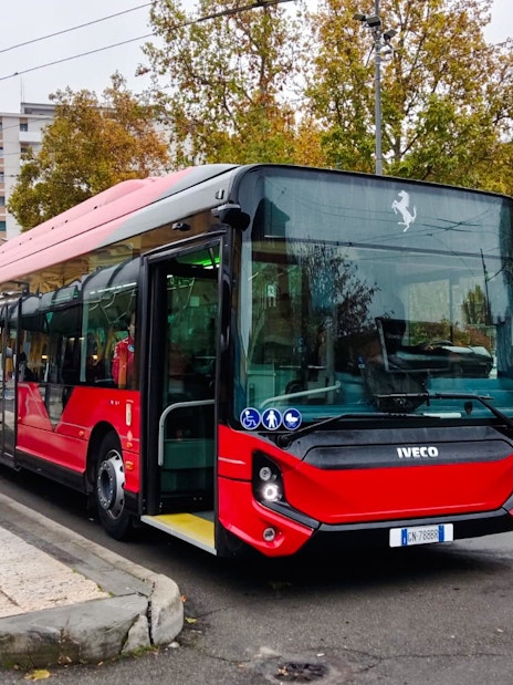 Shuttle bus at Modena stop for Ferrari Museums service.