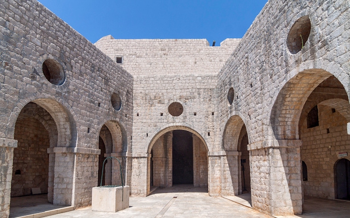 Stone arches and walls in Dubrovnik, Croatia, featured on the King's Landing Walking Tour.