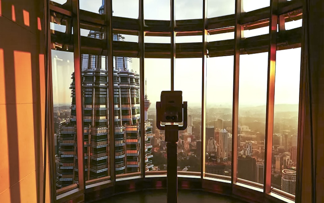 View of Kuala Lumpur skyline from Petronas Twin Towers observation deck.