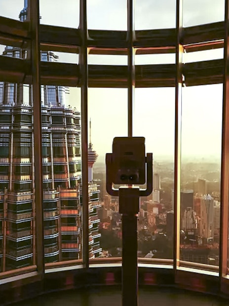 View of Kuala Lumpur skyline from Petronas Twin Towers observation deck.