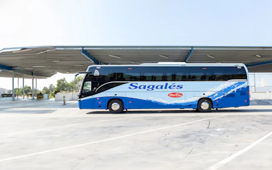 Bus at Girona Airport for transfer to Barcelona City Center.