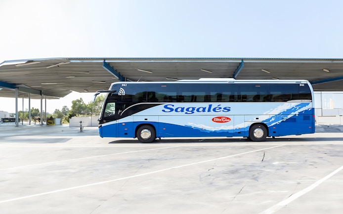 Bus at Girona Airport for transfer to Barcelona City Center.