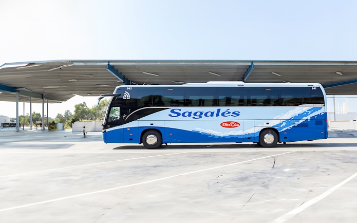 Bus at Girona Airport for transfer to Barcelona City Center.