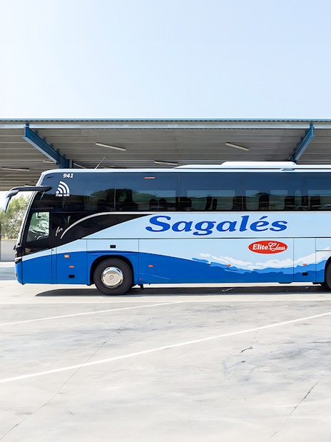 Bus at Girona Airport for transfer to Barcelona City Center.