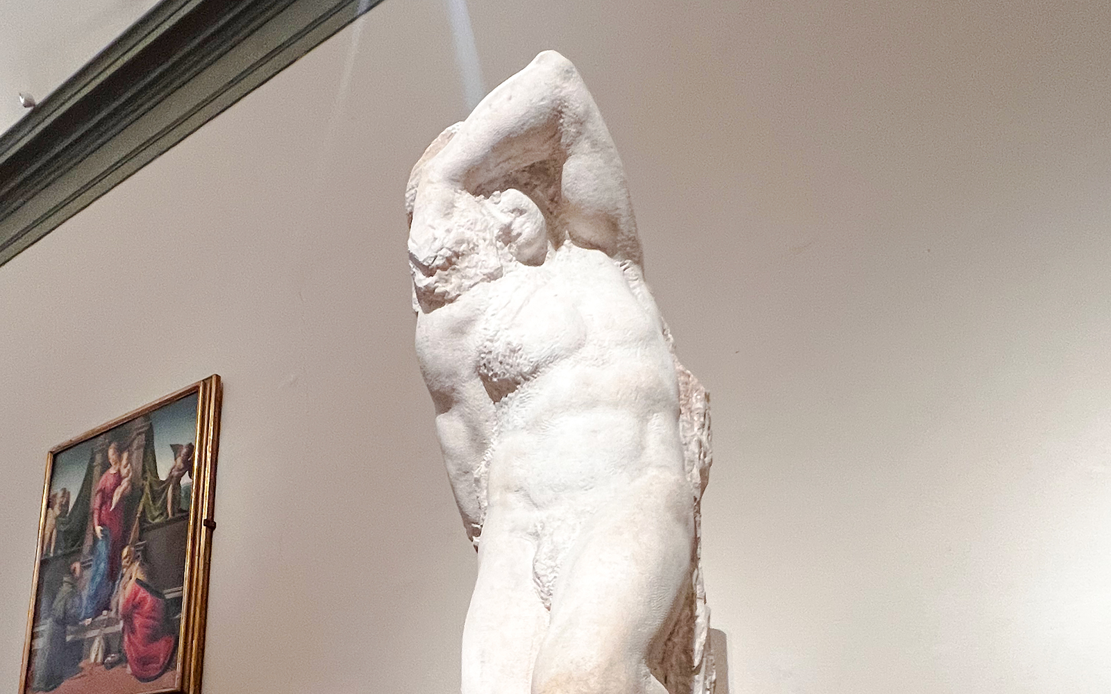 Young Slave sculpture in Accademia Gallery, Florence.