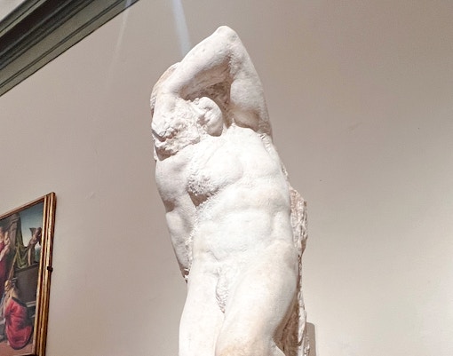Young Slave sculpture in Accademia Gallery, Florence.