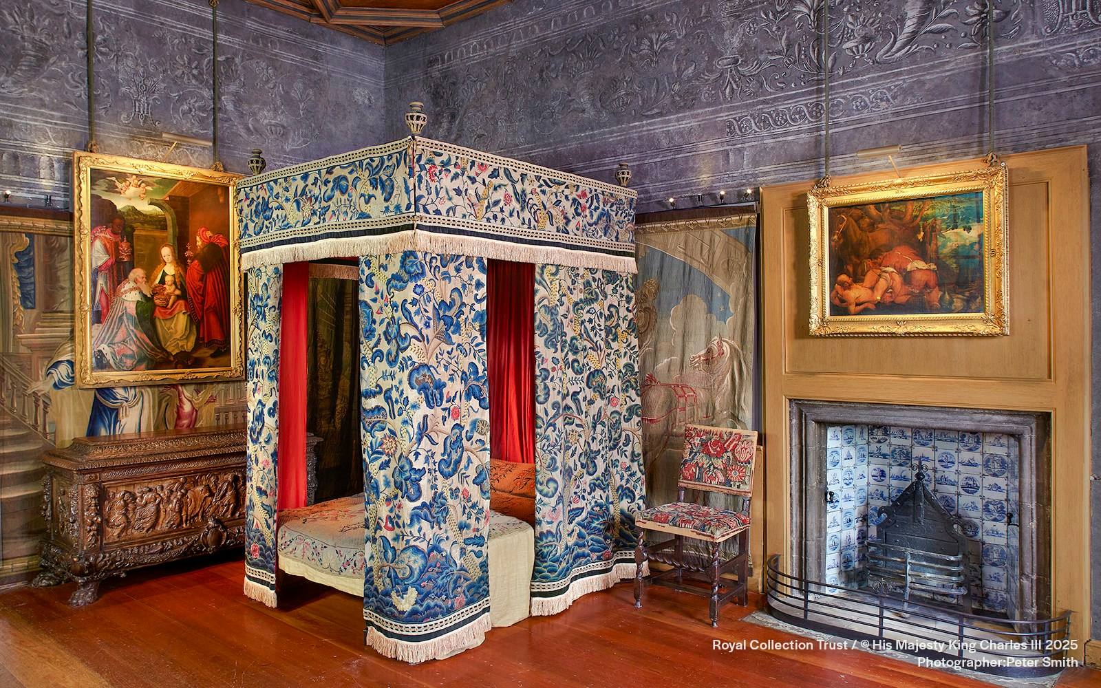 Mary Queen of Scots Bedchamber with ornate canopy bed and paintings at the Palace of Holyroodhouse.
