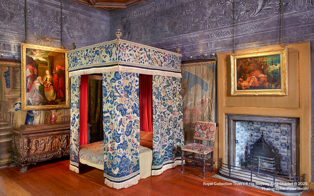 Mary Queen of Scots Bedchamber with ornate canopy bed and paintings at the Palace of Holyroodhouse.