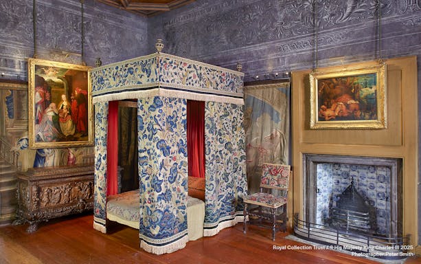 Mary Queen of Scots Bedchamber with ornate canopy bed and paintings at the Palace of Holyroodhouse.