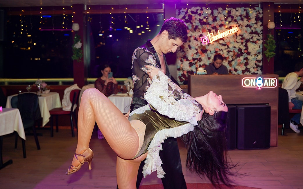 Dancers performing on a Bosphorus dinner cruise with Turkish show.