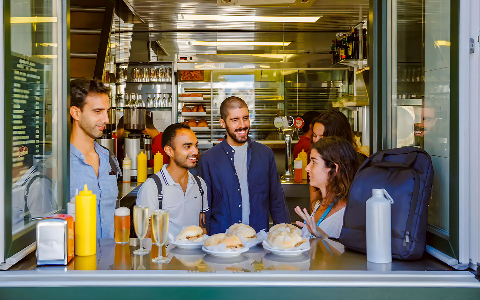 Tourist group with guide at a restaurant during Lisbon Food Walk in Baixa.