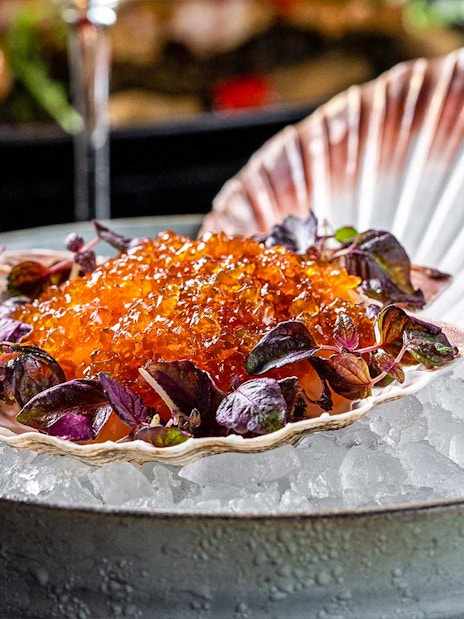Scallop shell with caviar and greens on ice, CÉ LA VI Dubai lunch set menu.
