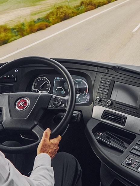 Driver's view from Alsa Granada Airport transfer bus dashboard on highway.