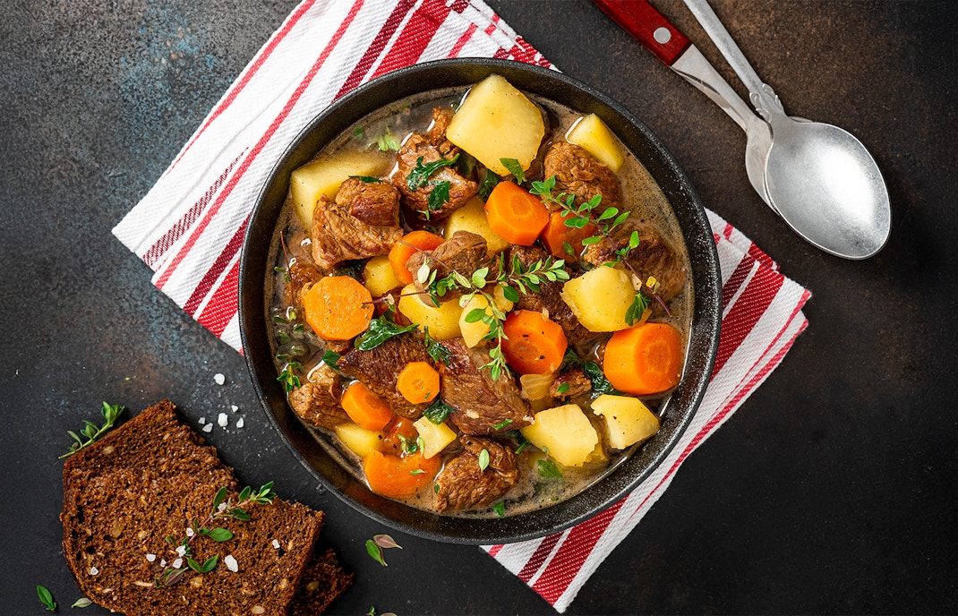 Traditional Irish stew served in a rustic pub in Belfast, Northern Ireland.