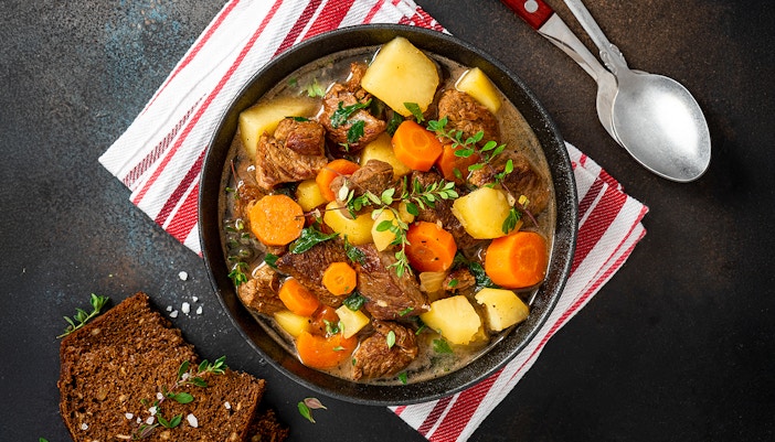 Traditional Irish stew served in a rustic pub in Belfast, Northern Ireland.