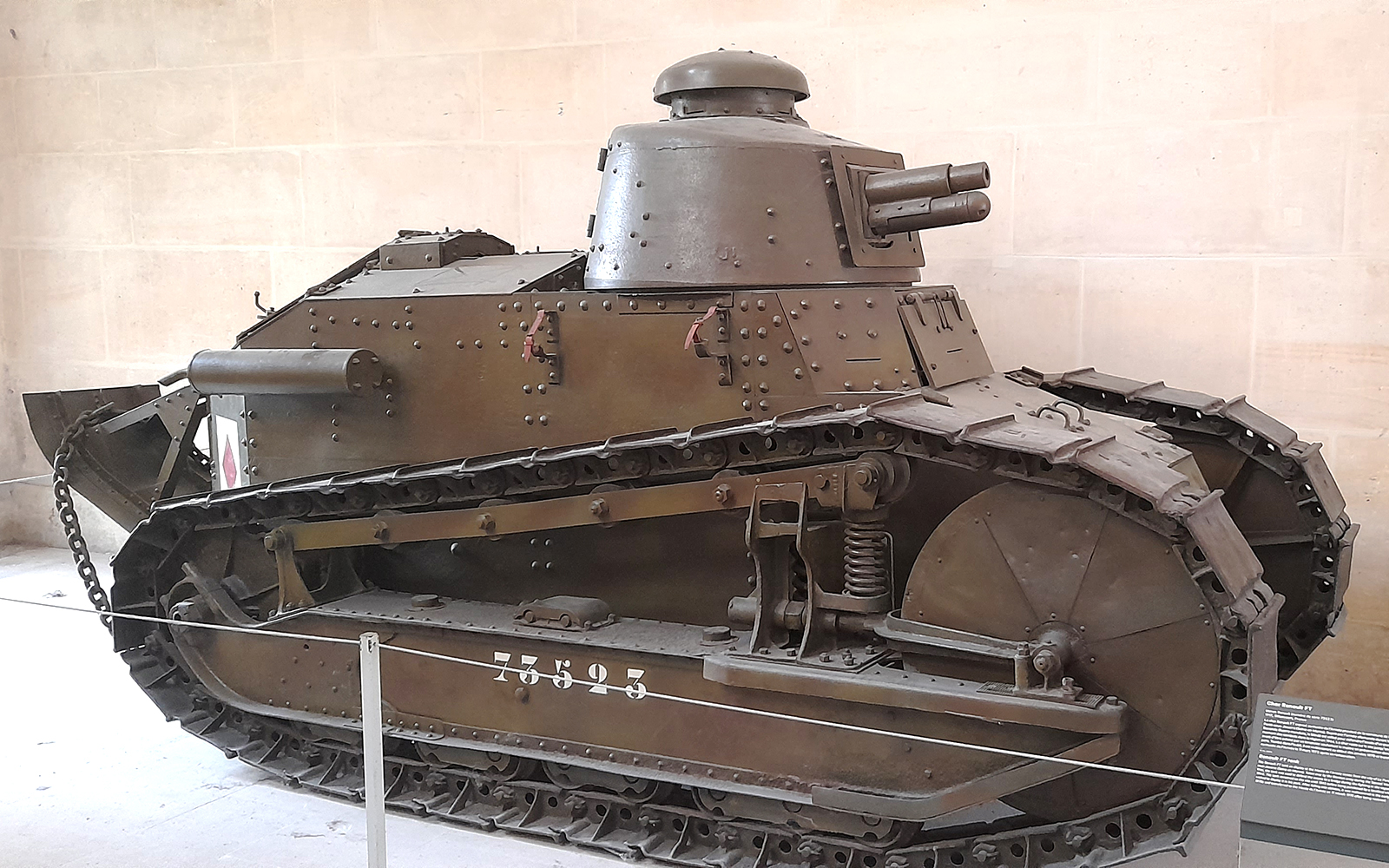 Hall of Military Innovation exhibits at Army Museum Paris with historical artifacts.