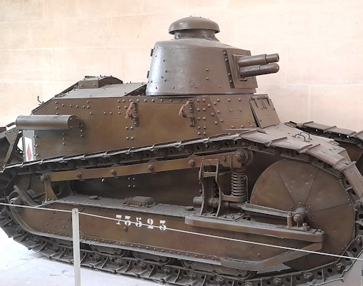 Hall of Military Innovation exhibits at Army Museum Paris with historical artifacts.