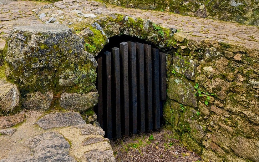 Moorish Castle Door of Betrayal in Sintra, Portugal, featuring ancient stonework.