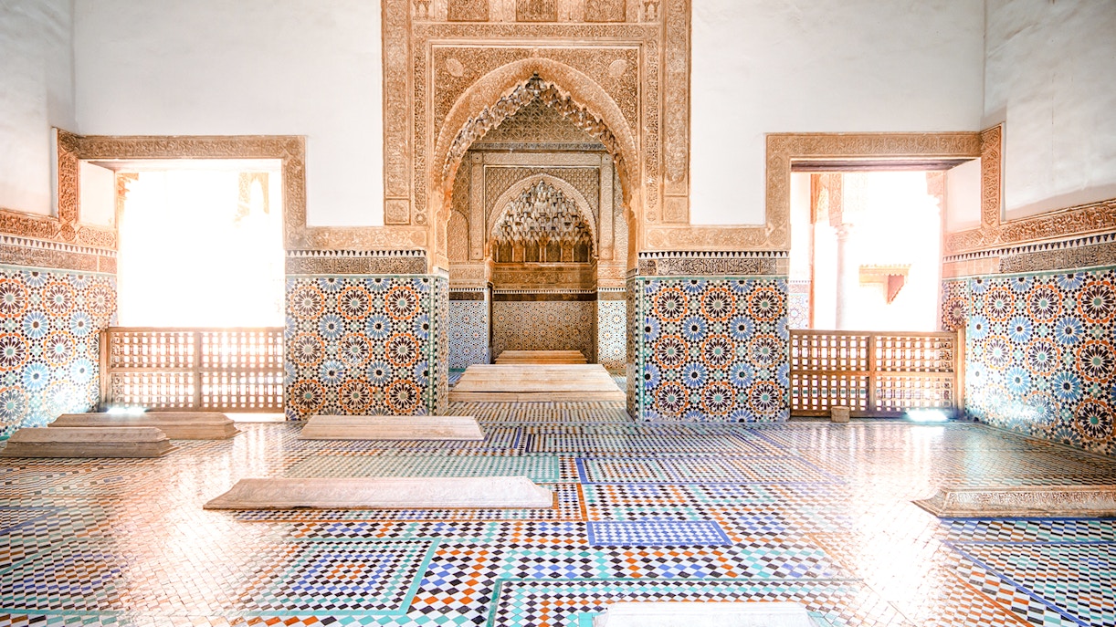Saadian Tombs interior with intricate mosaic tiles and carved arches, Marrakech.