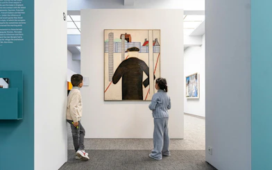 Children observing modern art at Groeningemuseum, Bruges.