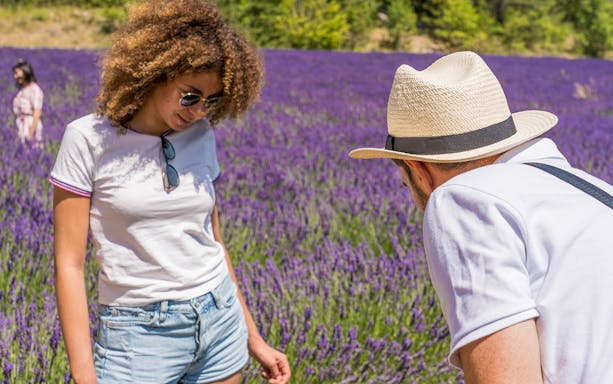 Tourists exploring a lavender field in Luberon during the Lavender Morning Tour.