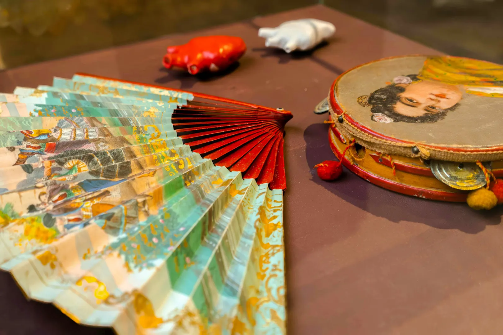 Decorative fan and tambourine at Tablao Casa de la Memoria, Seville.