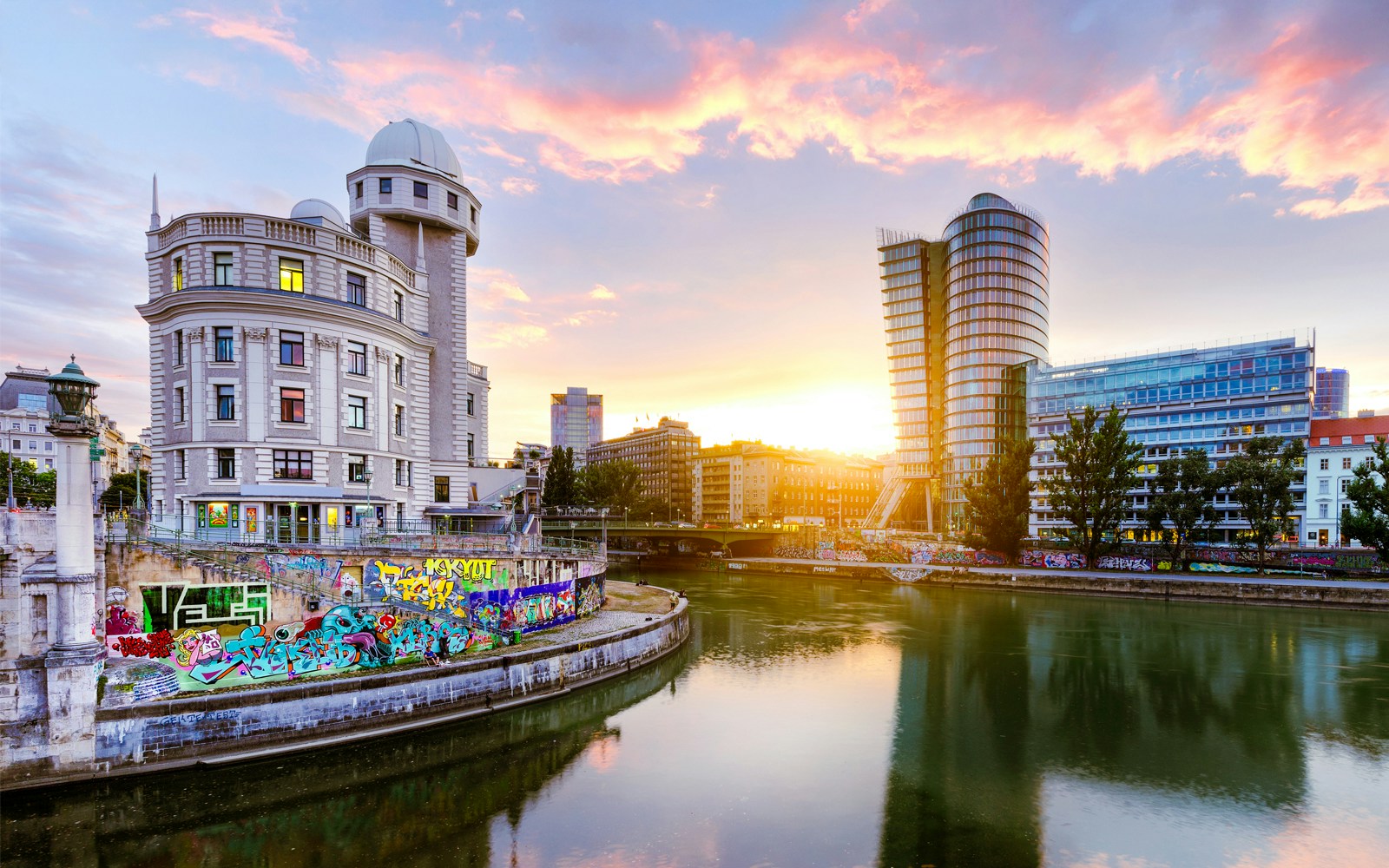 Urania observatory by the Donaukanal in Vienna, Austria, at sunset.
