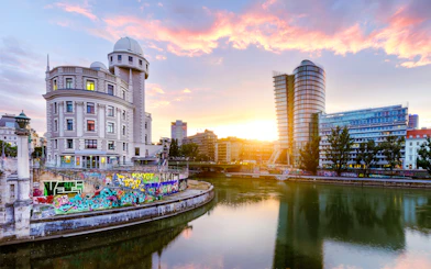 Urania observatory by the Donaukanal in Vienna, Austria, at sunset.