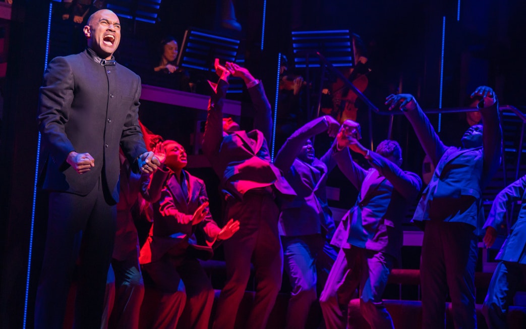 Actors performing a dramatic scene in Chess Broadway show.