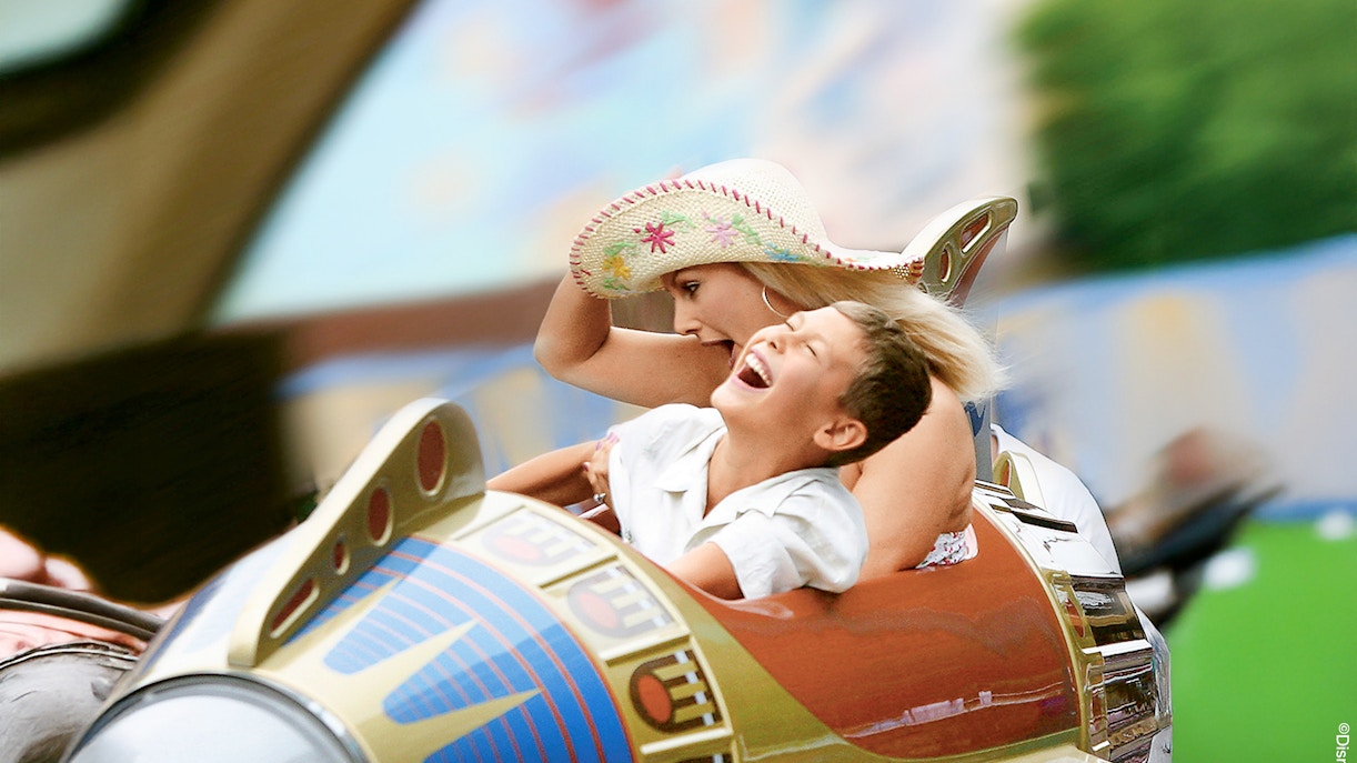 Guests enjoying a ride at Disneyland Park, California.