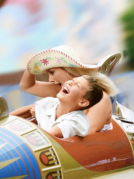 Guests enjoying a ride at Disneyland Park, California.