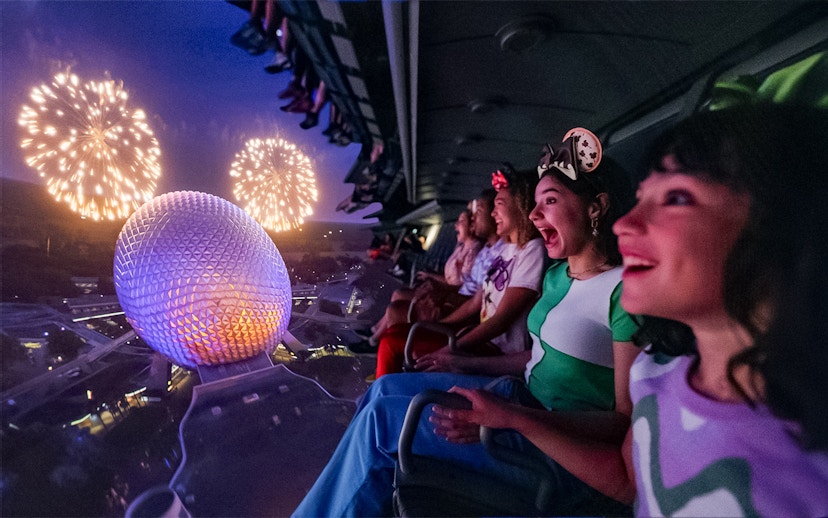 Guests enjoying fireworks from a ride at Mickey's Not-So-Scary Halloween Party, Walt Disney Resort, Orlando.