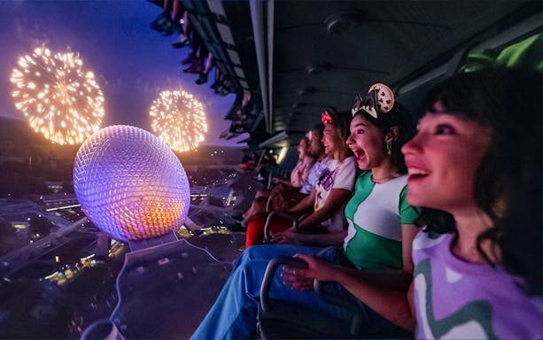 Guests enjoying fireworks from a ride at Mickey's Not-So-Scary Halloween Party, Walt Disney Resort, Orlando.