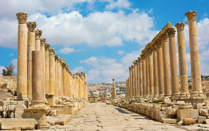 Cardo Maximus street with ancient columns in Jerash ruins, Jordan.