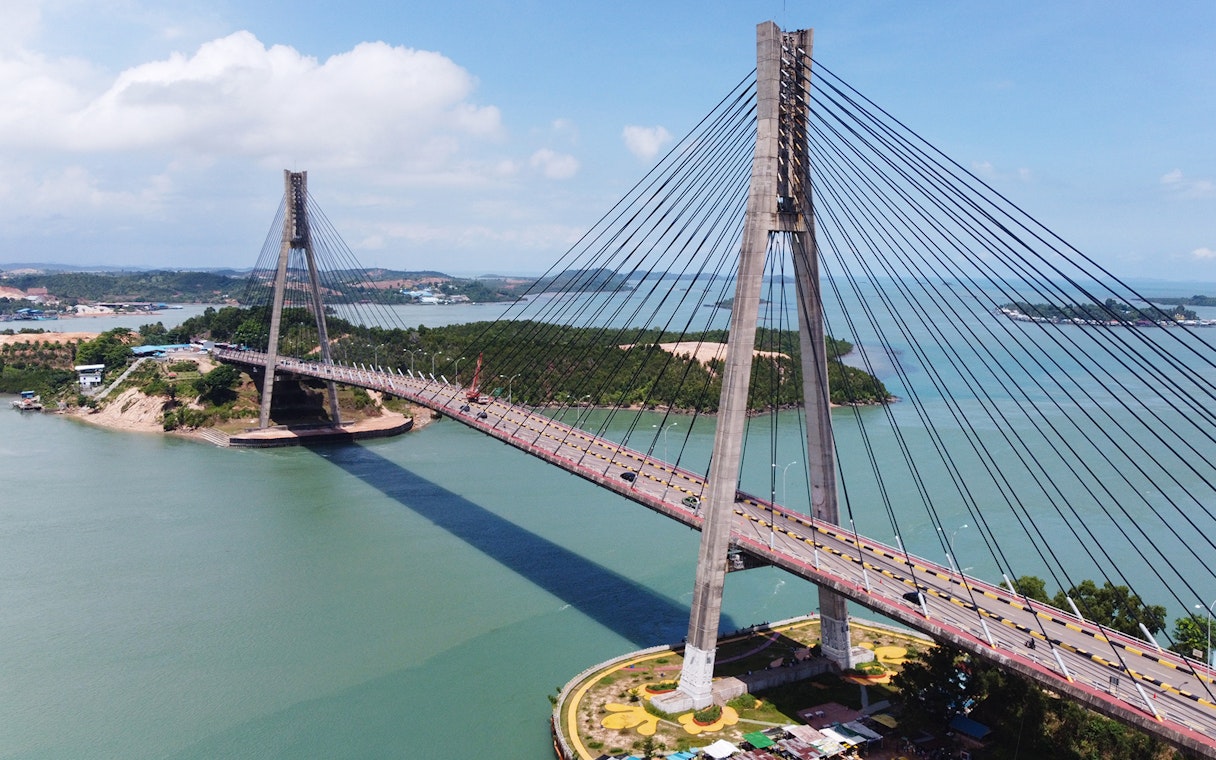 Barelang Bridge spanning over water in Batam, Indonesia, part of Harmoni One Batam 2 Days and 1 Night Package.